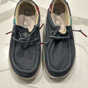 Never worn Hey Dude navy in color